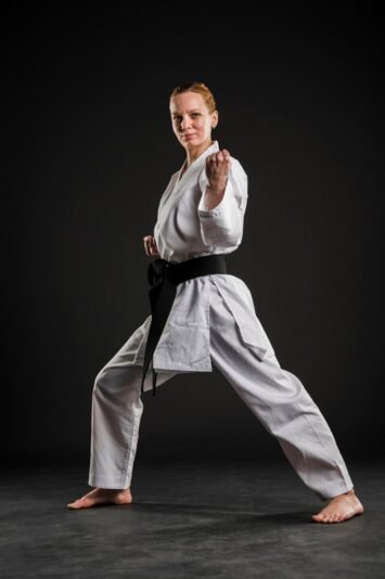 female-karate-fighter-performing_23-2148446195